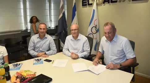 יגאל כרמי, גונן אוסישקין ואלי דפס (הוועד האולימפי בישראל)